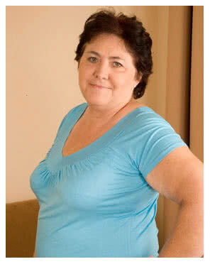 mature woman wearing blue top